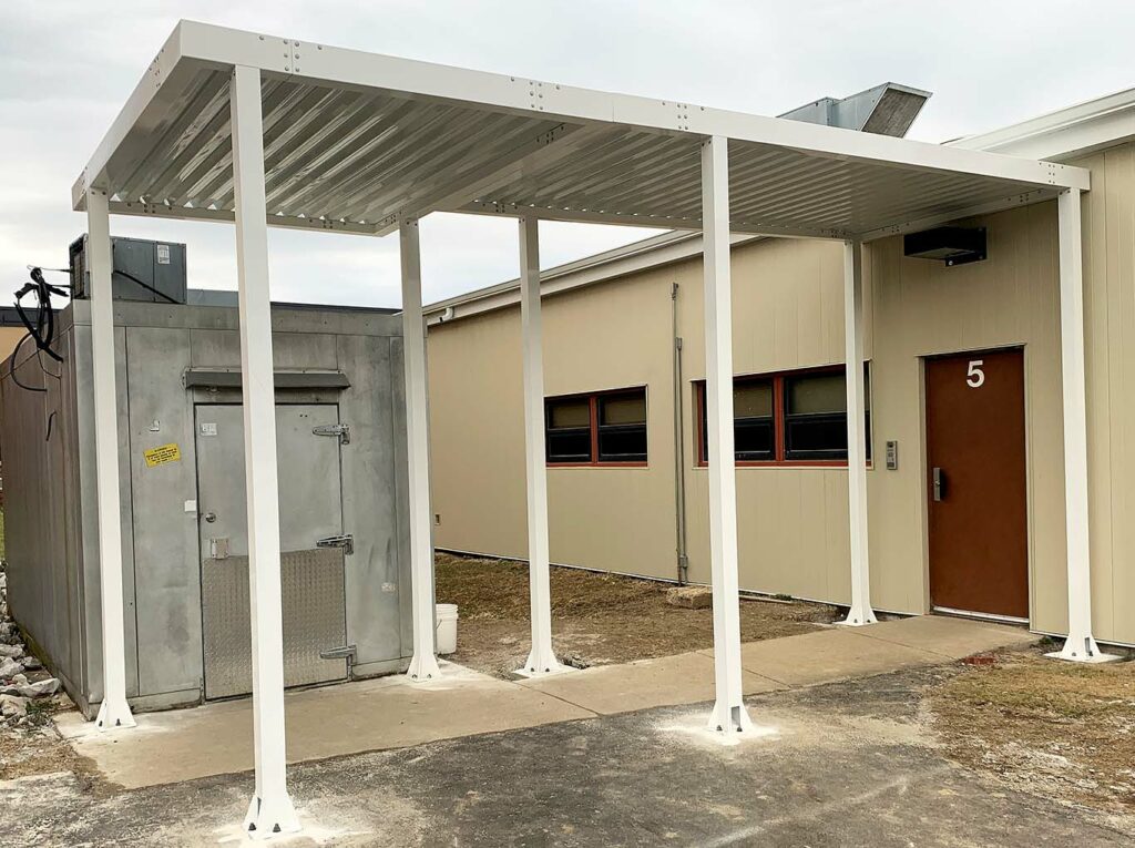 APEX Doorway Canopy Shelter Installed for Commercial Building