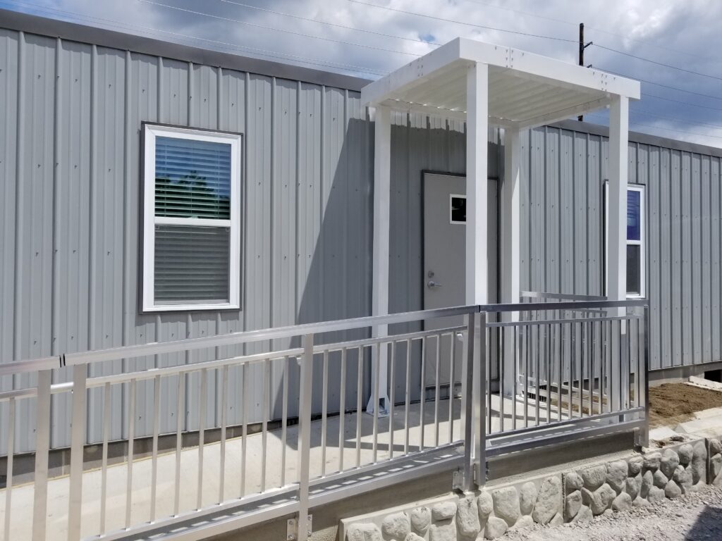 Canopy and Wheelchair Ramp Installation for Pac-Van