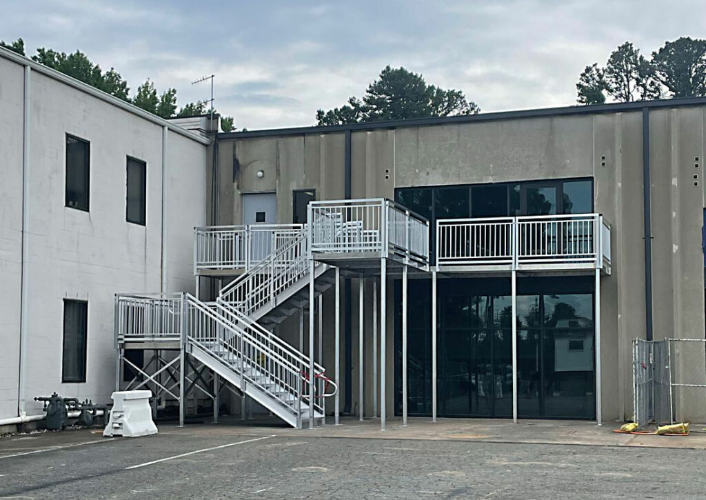 Metal office stair and deck with railing